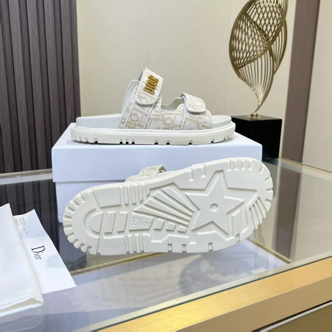 👟👟Ex-factory price 480👟👟 Dior classic popular sandals Step into the fashion territory of Dior slippers and encounter the ultimate fusion of elegance and comfort. The upper is engraved with the Christian Dior Paris logo using exquisite embroidery technology. The delicate stitching tells the brand's profound heritage and is fully recognizable.   Made of high-quality materials, it feels soft and fits your feet, as if it is a gentle care tailor-made for your feet. The sole is carefully designed and engraved with Christian Dior's lucky star symbol. It is not only a beautiful embellishment, but also provides reliable grip, making every step steady and secure.   It has a simple design and is easy to put on and take off. Whether it is a lazy weekend or a pleasant vacation, it can be easily adapted. Whether paired with casual shorts, casual jeans, or an elegant dress, Dior slippers can instantly enhance the overall style and show a casual fashion attitude.   Dior slippers, in the name of fashion, inject luxurious charm into your life and accompany you with every step you take with confidence and elegance. Material: Fine genuine cowhide upper, outsole, TPR, non-slip and wear-resistant, code number: 35-41 (42 customized)